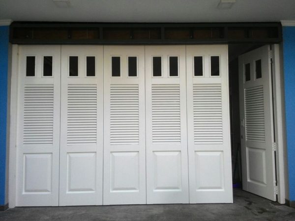 pintu garasi motif kaca 600x450 - Patra Door